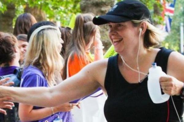 Elaine hi-fiving crowds at the Richmond RunFest