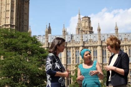Three women talking outside the House of Commons