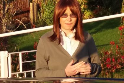 A photo of Amanda in October 2016 a month before her diagnosis sat outside in the garden