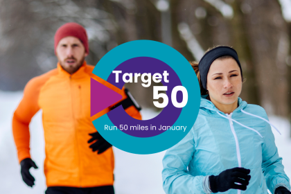 Two people running outside in snow with the Target 50 logo over the top