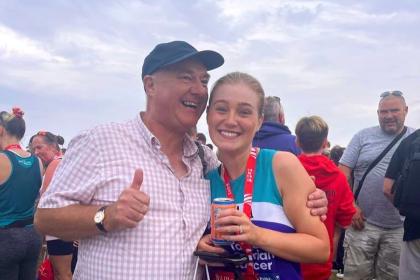 Female Runner and Male smiling at the Great North Run 2023.JPG