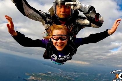 Female supporter smiling on a skydive