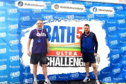 Two male supporters smiling at the Bath Ultra Challenge 2025