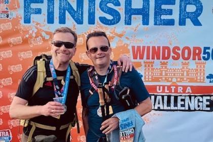 Two male supporters smiling at the Ultra Challenge Windsor 2026