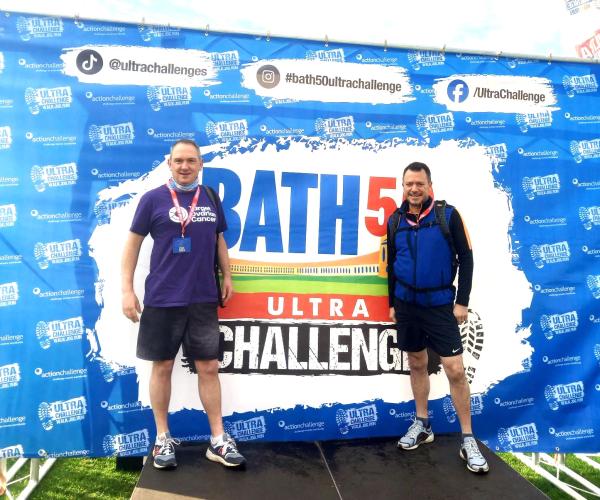 Two male supporters smiling at the Bath Ultra Challenge 2025