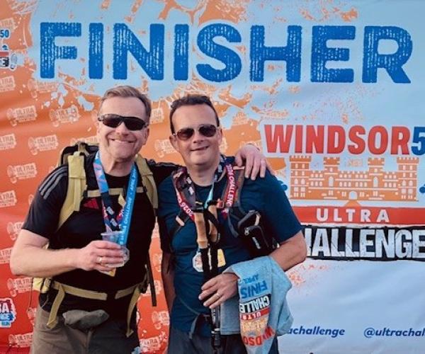 Two male supporters smiling at the Ultra Challenge Windsor 2026