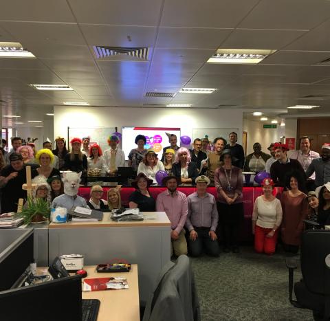 A large office team in fancy dress to raise money for Target Ovarian Cancer