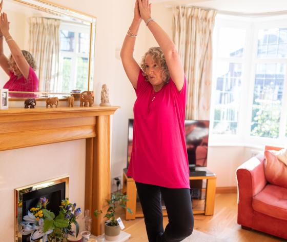 Woman doing yoga at home