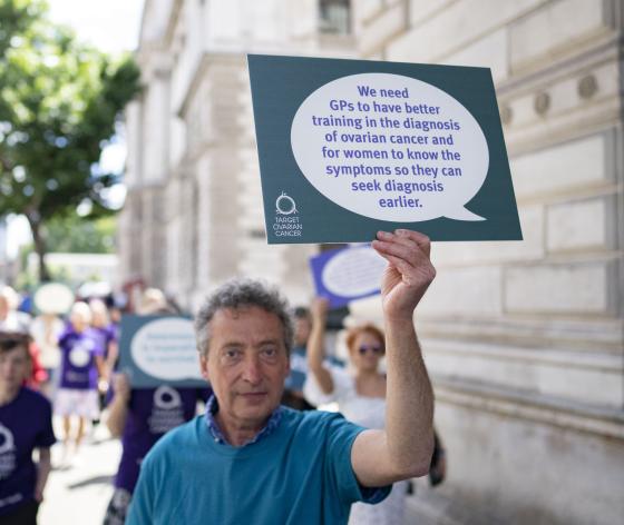 Campaigner holding placard