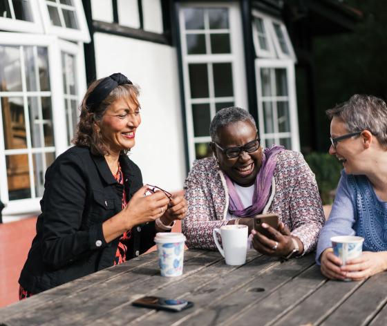 campaigners talking over tea 