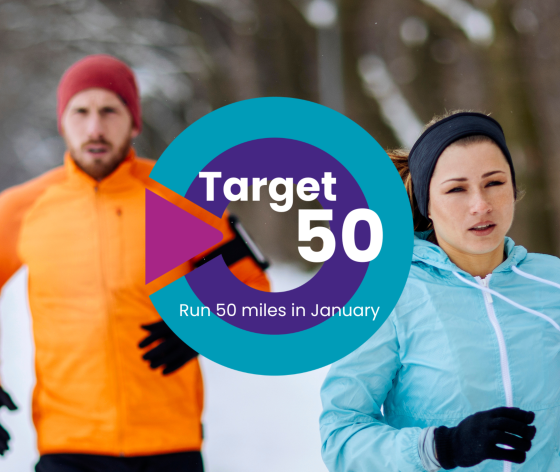Two people running outside in snow with the Target 50 logo over the top
