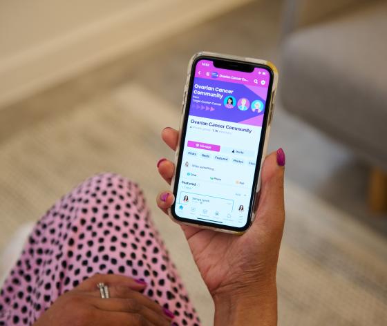 Image of a phone showing the Ovarian Cancer Community
