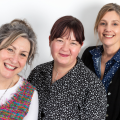 A photo of Target Ovarian Cancer's specialist support line nurses, Val, Rachel and Luisa