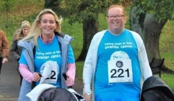 Sarah and her auntie taking part in the Belfast Walk Run wearing Target Ovarian Cancer tshirts and pushing a toddler in a pram