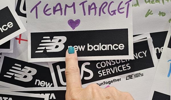 A notice on the wall that reads Team Target with a finger pointing towards it