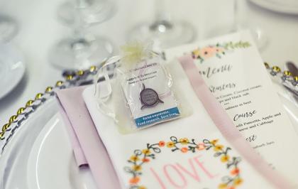 A Target Ovarian Cancer wedding favour pin badge