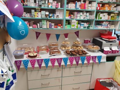 A bake sale for Target Ovarian Cancer held in a healthcare professional's office