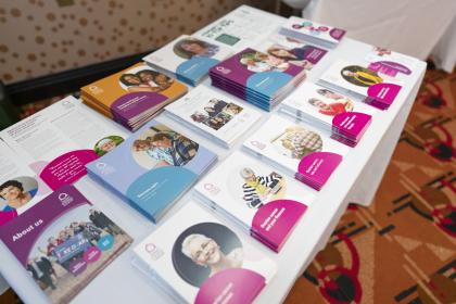 A table with information guides laid out on it