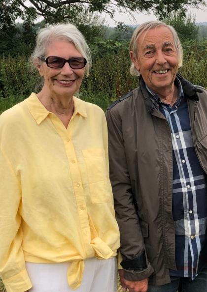 Mo outside smiling with her boyfriend David