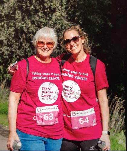 Liz pictured with her daughter wearing pink Target Ovarian Cancer Walk Run tshirts