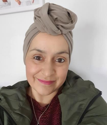 Linda wearing a scarf on her head