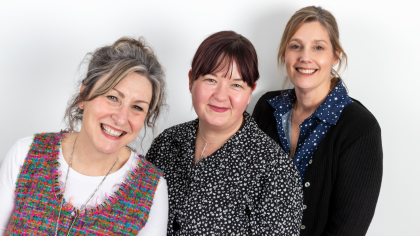 A photo of Target Ovarian Cancer's specialist support line nurses, Val, Rachel and Luisa