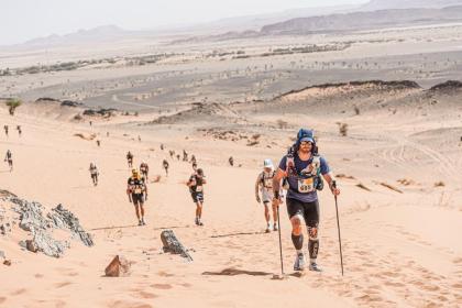 Adam in the Sahara dessert taking on the Marathon des Sables 