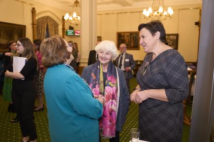 An image of Annette Badland and Annwen Jones in conversation at Target Ovarian Cancer's Pathfinder event at the Houses of Parliament