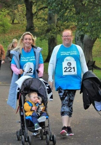 Sarah and her auntie taking part in the Belfast Walk Run wearing Target Ovarian Cancer tshirts and pushing a toddler in a pram