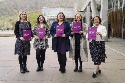 The Target Ovarian Cancer team outside Scottish Parliament holding the Pathfinder report