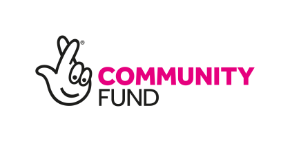 The National Lottery Community Fund logo - a white crossed fingers with a cartoon face with community fund written next to it