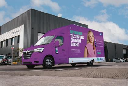 An image of a purple van reading 'do you know the symptoms of ovarian cancer' on the side