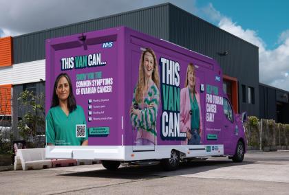 An image of a purple van reading 'do you know the symptoms of ovarian cancer' on the side