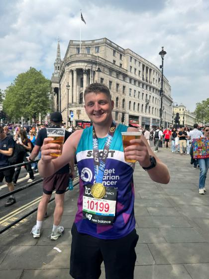 Scott at the end of the London Marathon wearing his Target Ovarian Cancer running vest and London Marathon medal!