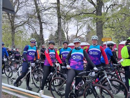 Lotte and her family and friends all ready to cycle wearing Target Ovarian Cancer tshirts