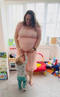 Grace while pregnant with her second child.