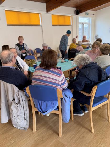 People gathered at a coffee morning organised by Claire and Darcie to raise money for Target Ovarian Cancer.